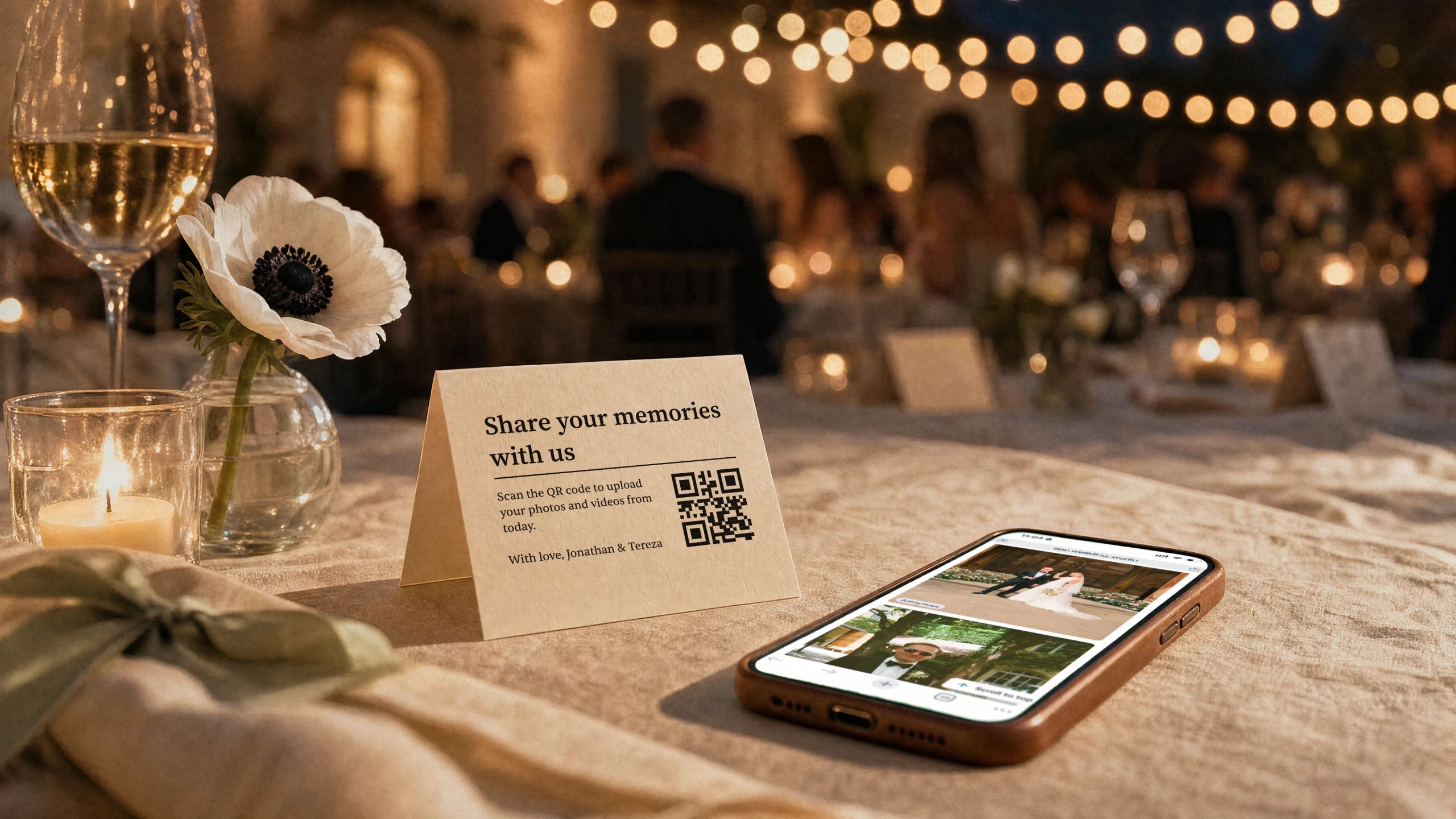 Wedding guests uploading their photos through a QR code table card into one shared album